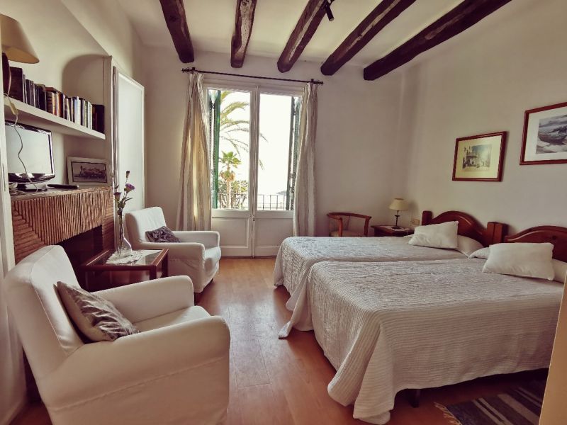 El dormitorio de un alojamiento turístico en Sitges